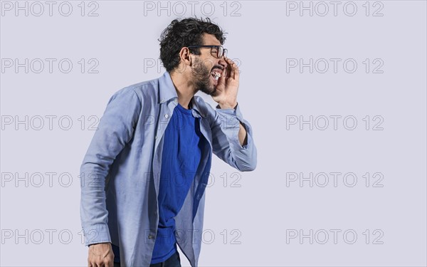 Side view of a man shouting out loud isolated. Person announcing and yelling isolated