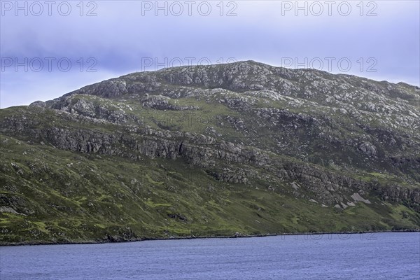 Glencoul Thrust on the Aird da Loch peninsula showing Cambrian quartzite sandwiched between layers