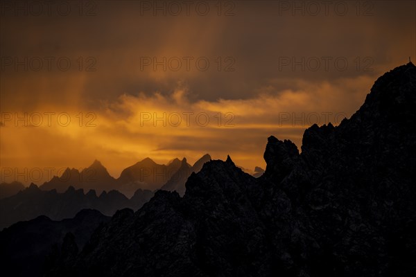 Montafon mountains with dramatic cloudy sky at sunrise, Tschagguns, Rätikon, Montafon, Vorarlberg,