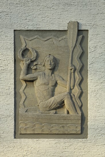 Relief rower with paddle and wreath in boat, rowing, arm, up, hold, sculpture, figure, sport,