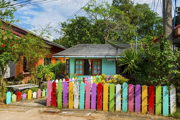 Pastel-coloured house with colourful fence, colourful, colourful, imaginative, living, building,