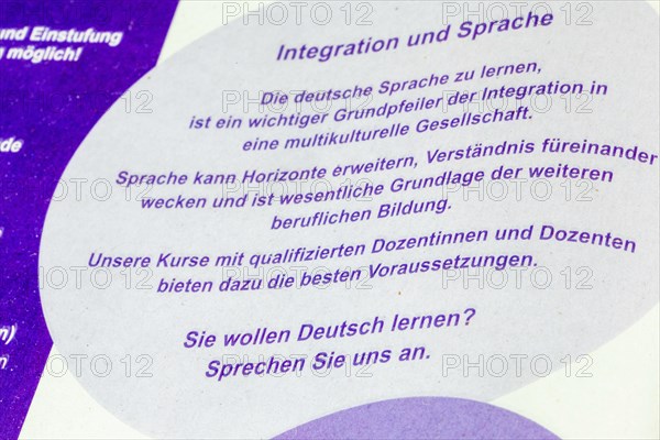 Symbolic image of integration: advertising for a German course at an adult education centre
