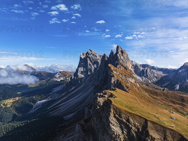The Sas Rigais and Furchetta peaks of the Odle Group, drone shot, Val Gardena, Dolomites,