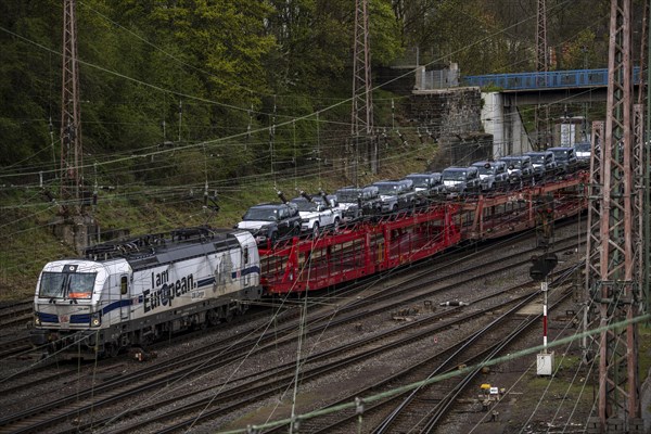 Freight train, car train with Landrover new cars on the goods train line at the Hagen-Vorhalle