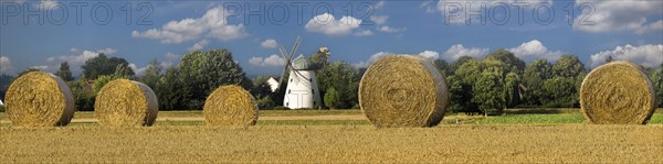 Panorama Historic windmill with straw bales Tündern Hameln Germany