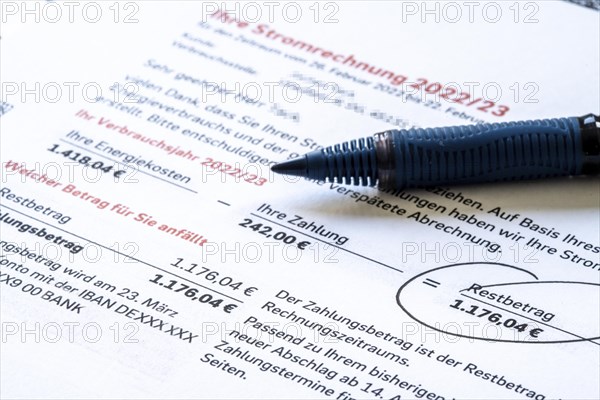 Symbolic image of electricity bill, billing of an electricity provider, additional payment due to