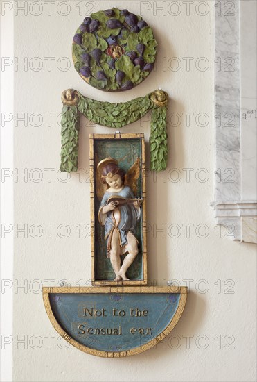 Painted plaster angels in village parish church of Saint Michael, Wilsford cum Lake, Wiltshire,