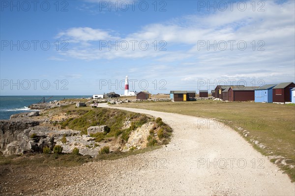 Red and white lighthouse on the coast at Portland Bill, Isle of Portland, Dorset, England, United