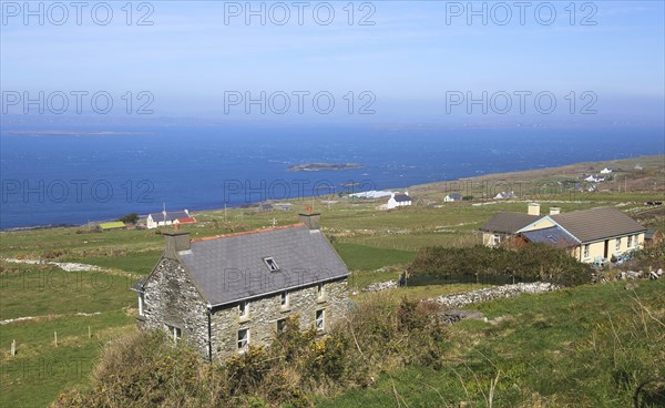 Houses along the west coast of Cape Clear Island, County Cork, Ireland, Irish Republic, Europe