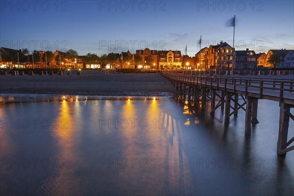 Jetty and promenade of a town, twilight, illuminated, Wyk auf Föhr, North Sea island Föhr,