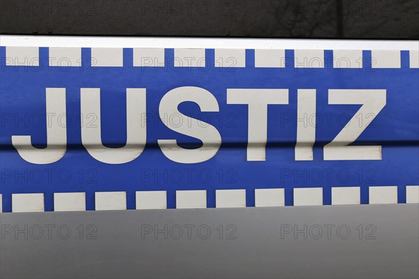Justice lettering on the emergency vehicle of the German judicial authority