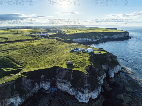 Cliffs over Flamborough Seawatch Observatory from a drone, Flamborough, Yorkshire, England, United