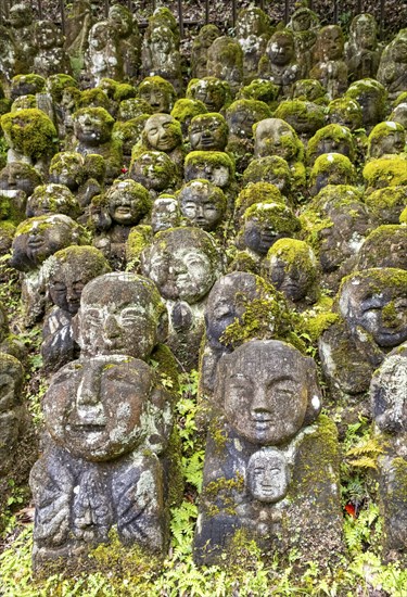 Moss-covered stone statues of rakans, the disciples of Buddha, Otagi Nenbutsu-ji temple, Kyoto,