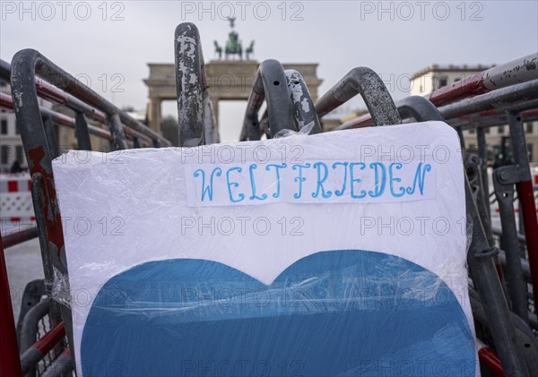 Demonstration, posters and barriers at the Brandenburg Gate, Berlin, Germany, Europe