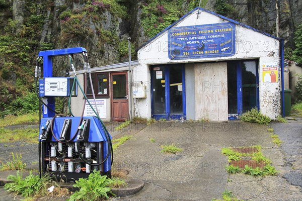 Closed filling station garage, Blaenau Ffestiniog, Gwynedd, north Wales, UK