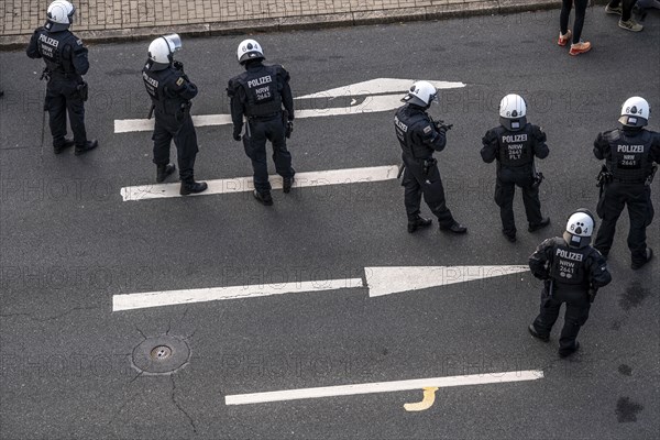 Police officers, police task force, on duty at the demonstration against the AFD party conference