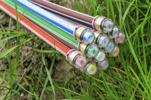 Fibre optic cable, freshly laid along a dirt road, provision of high-speed Internet in rural areas,