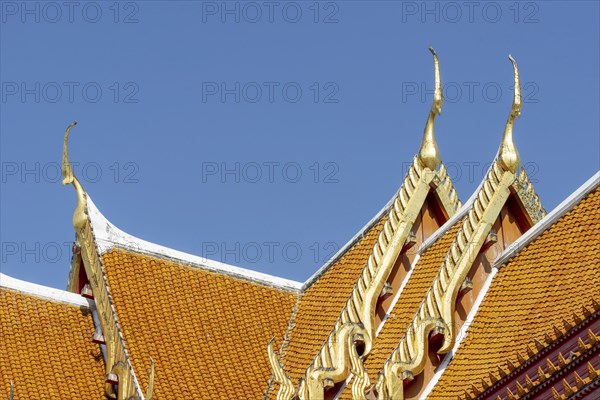 Roof decoration at the Uposatha Hall, Ubosot, the roof is staggered in three tiers and covered with