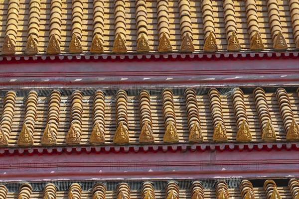 Roof decoration at the Uposatha Hall, Ubosot, the roof is staggered in three tiers and covered with