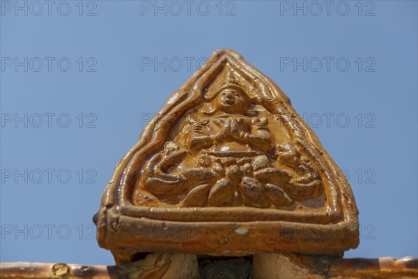 Roof decoration at the Uposatha Hall, Ubosot, the roof is staggered in three tiers and covered with
