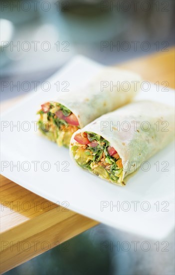 Healthy roasted vegetables and salad vegetarian wrap sandwich
