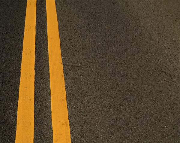 Double Yellow Marking Lines On A Road With Copy Space