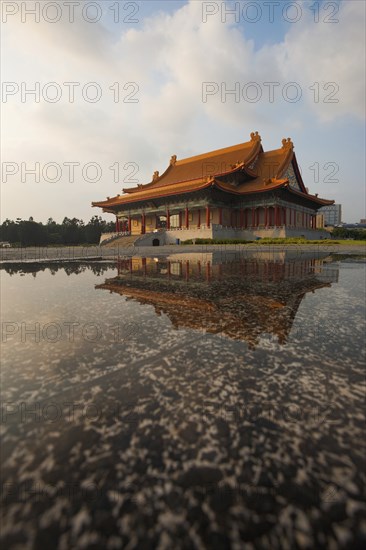 A water reflection of the National Concert Hall in Liberty Square of downtown Taipei