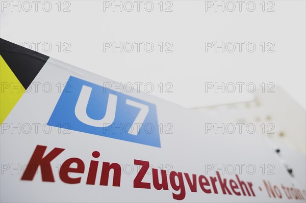 A sign indicates the suspension of train services on the underground line 7 in Berlin, 27 February