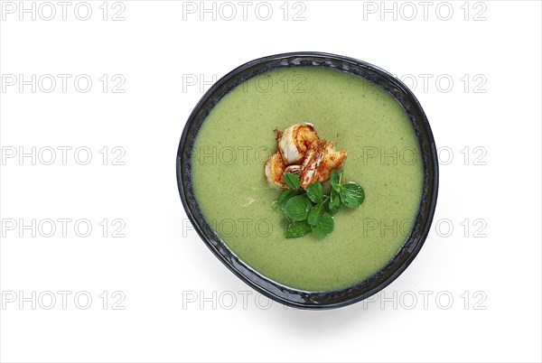 Pea cream soup, with shrimp, green soup, homemade, top view, no people, isolate, on a white