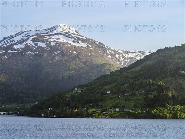 Mountains and Fjord over Norwegian Village, Olden, Innvikfjorden, Norway, Europe