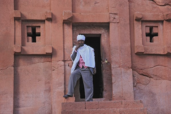 Lalibela, eastern group of rock-hewn churches, pilgrims at the entrance to the Bete Abba Lebanon,