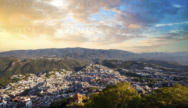 Mexico, Taxco city lookout overlooking scenic hills and colorful colonial historic city center,