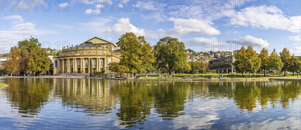 Autumn atmosphere at the opera house with Eckensee. The state parliament building on the right.