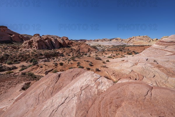Layered rock formations along the Fire Wave Trail at Valley of Fire State Park near Overton, Nevada