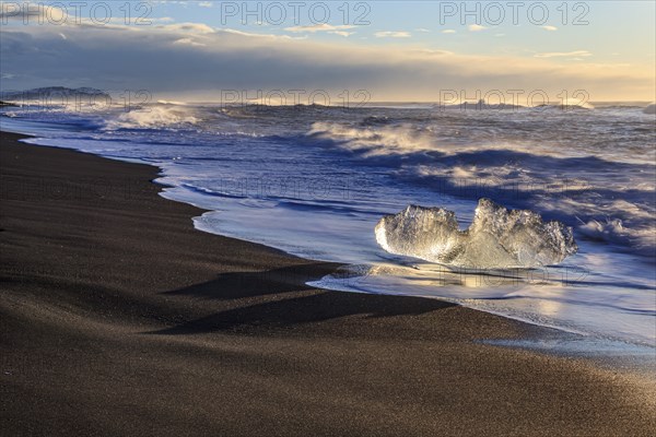 Ice floes on the beach, waves, sunny, morning mood, winter, Diamond Beach, Breidamerkursandur,