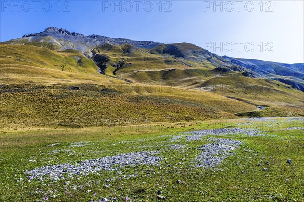 View of road and mountains at border pass Col de Larche (Colle della Maddelena), Provinz Cuneo,