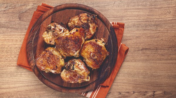 Fried chicken thighs, with spices, homemade, no people