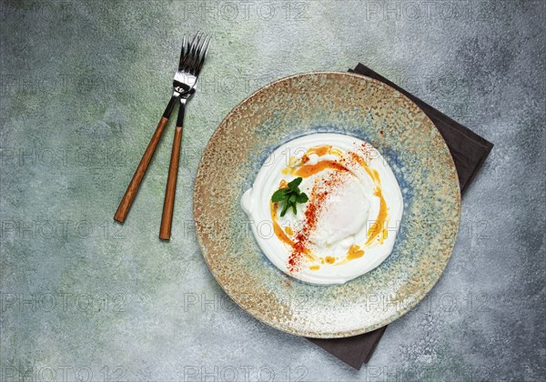 ?ilbir, traditional Turkish breakfast, Turkish eggs with yogurt and butter, homemade, no people