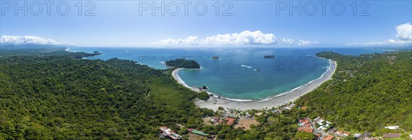 Aerial view, coast and town, Corrohoe Bay and Playa Espadilla, Manuel Antonio National Park,