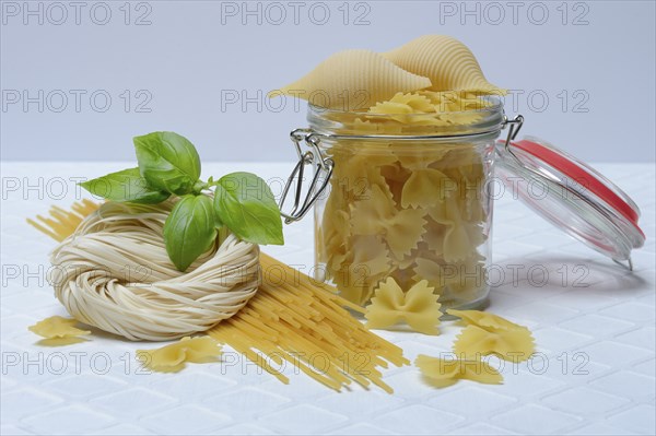 Various types of pasta with glass container, pasta varieties