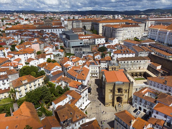 Central city view with old buildings and a striking historic church in the centre, aerial view,