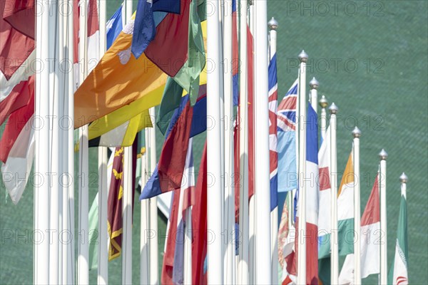 Many flags in front of the United Nations Conference Centre, Bangkok, Thailand, Asia