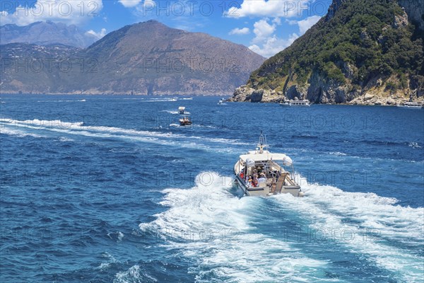 Capri, Campania, Italy, June 16, 2022: Italy, scenic views of Capri from boat cruise around the