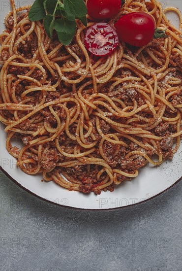 Spaghetti bolognese, in a frying pan, top view, homemade, no people