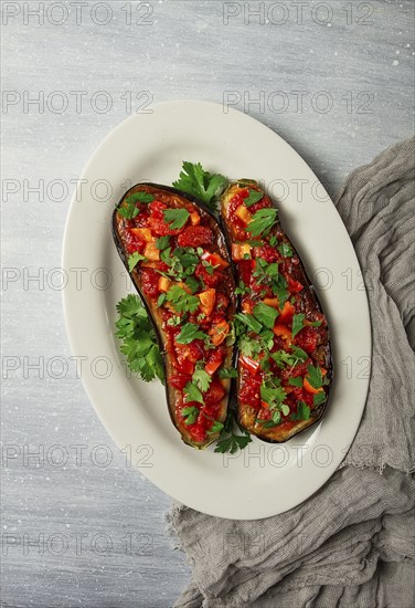 Traditional Turkish dish, Imam Bayildi, stuffed eggplant, with tomatoes and herbs, baked, no
