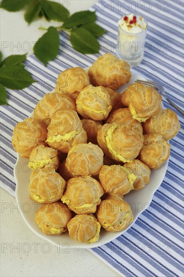 Swabian cuisine, mini cream puffs filled with goat's cream cheese, cream cheese éclairs,