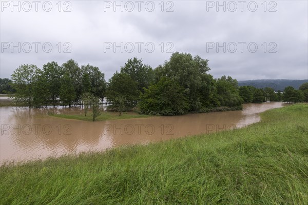 Symbolic image extreme weather, global warming, climate change, flood retention basin, flood