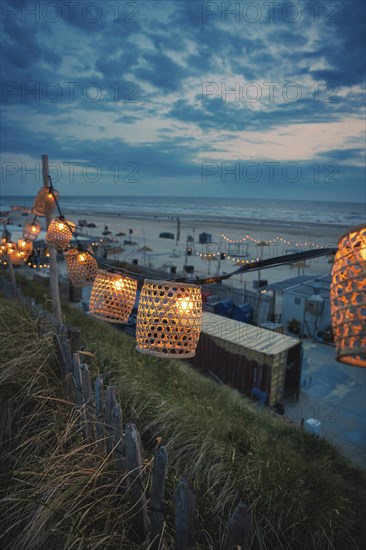 String of lights on the beach at blue hour, Zandvoort, Netherlands
