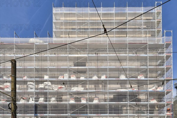 Karlsruhe, Germany, August 2021: Large construction site with scaffolding on multistory building