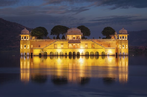 Rajasthan landmark, Jal Mahal Water Palace on Man Sagar Lake in the evening in twilight. Jaipur,